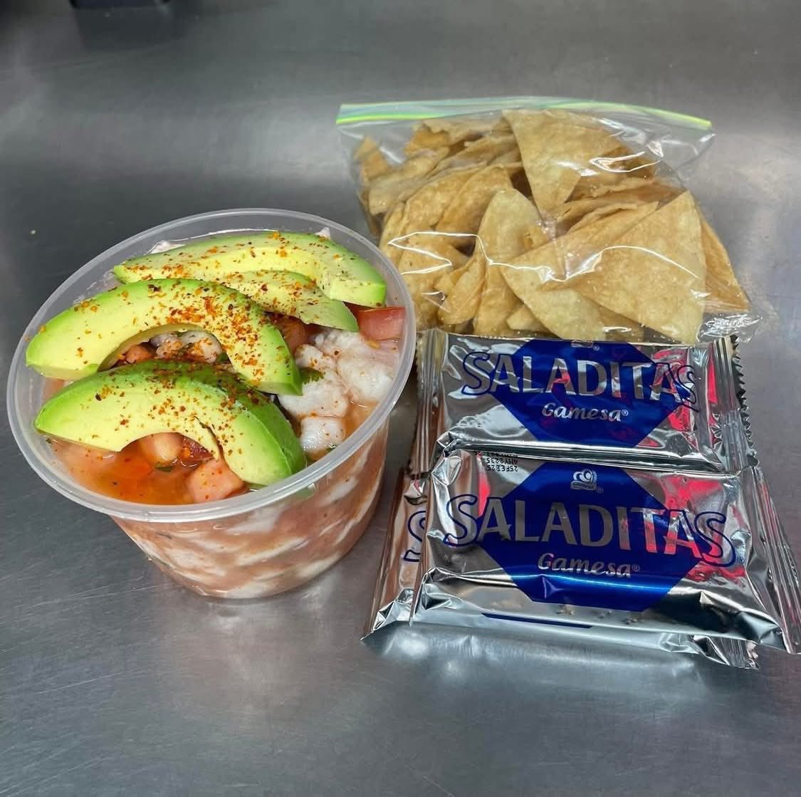 Shrimp ceviche cup with avocado and saladitas crackers