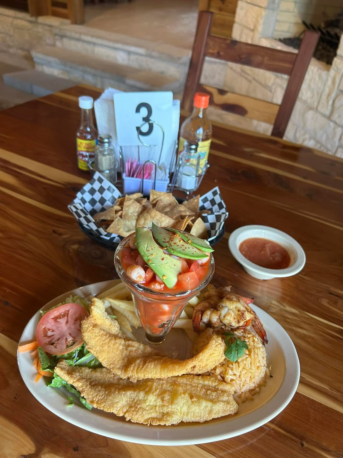 Fried fish plate with shrimp cocktail and chips