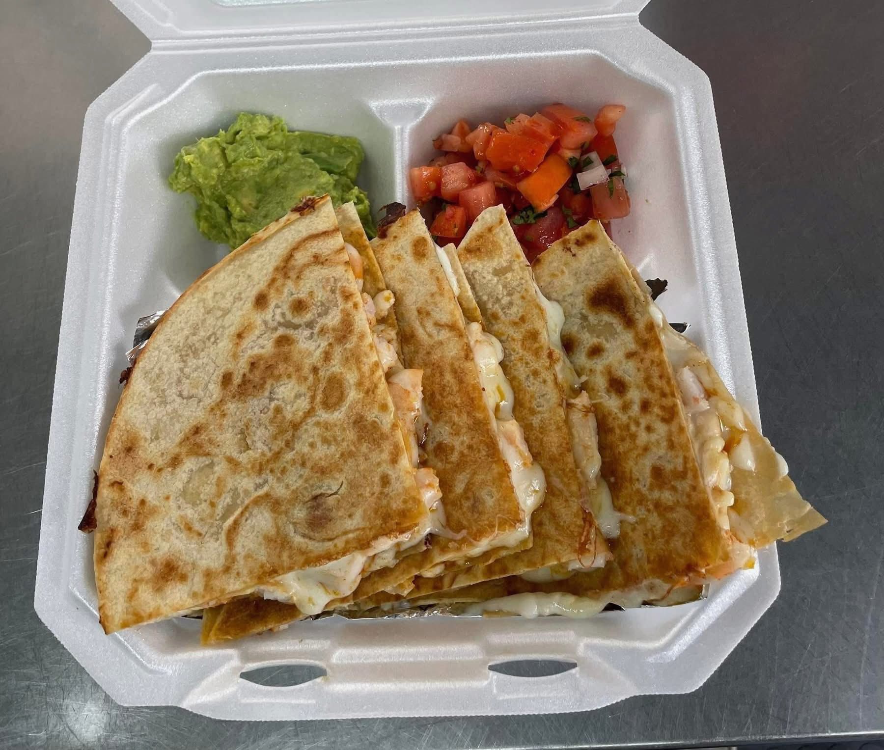 Shrimp quesadilla with guacamole and pico de gallo